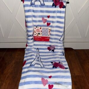 Netflix’s Emily in Paris Striped Eiffel Tower and Roses Plush Throw Blanket